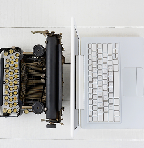 typewriter and laptop