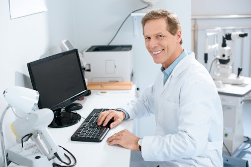 medical doctor at a desk