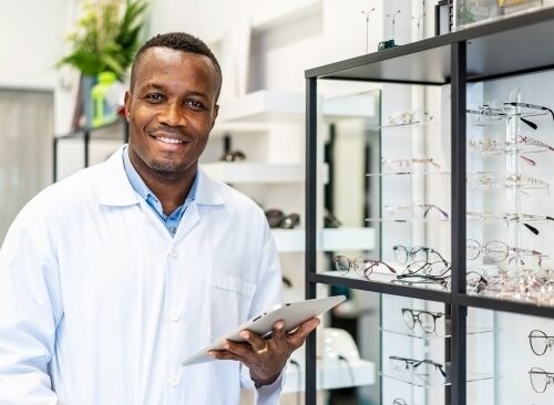 optometrist holding a tablet